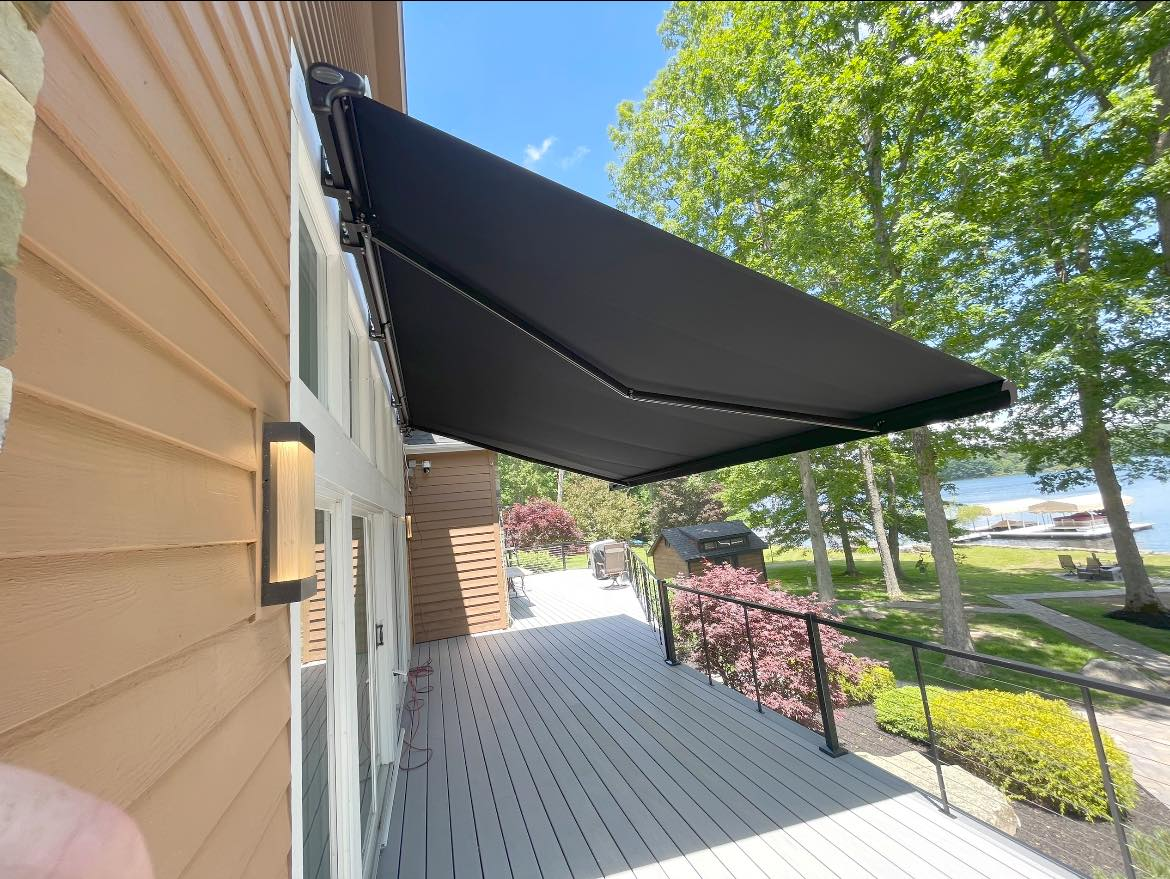 retractable canvas awning installed over top of back deck by Country Canvas awnings view 2