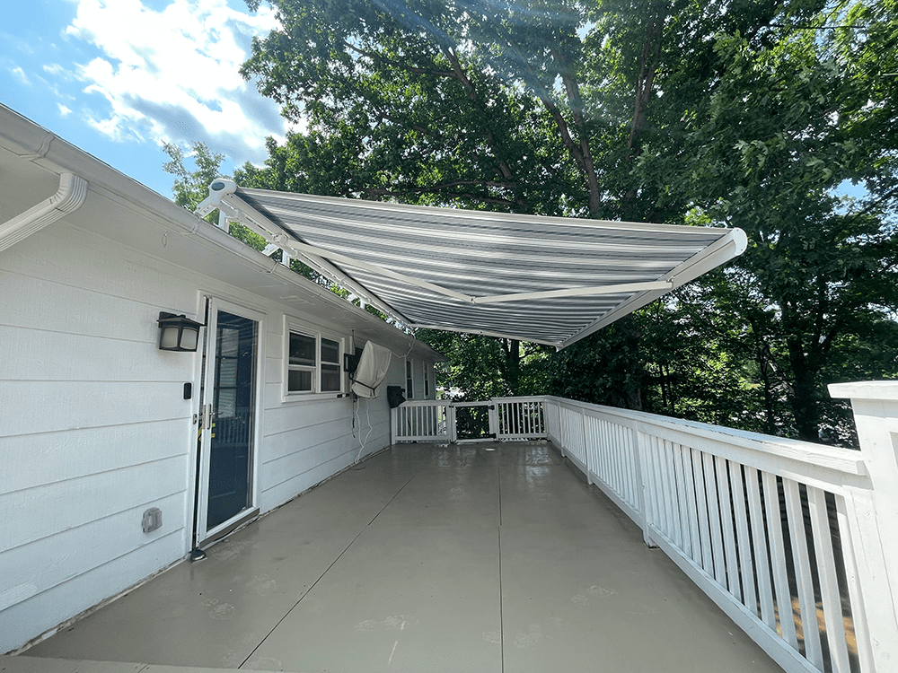 retractable canvasa wning over a deck