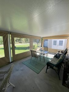 inside view of a porch with curtain enclosures
