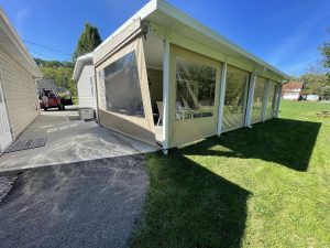 tan colored vinyl curtain enclosure installed on porch
