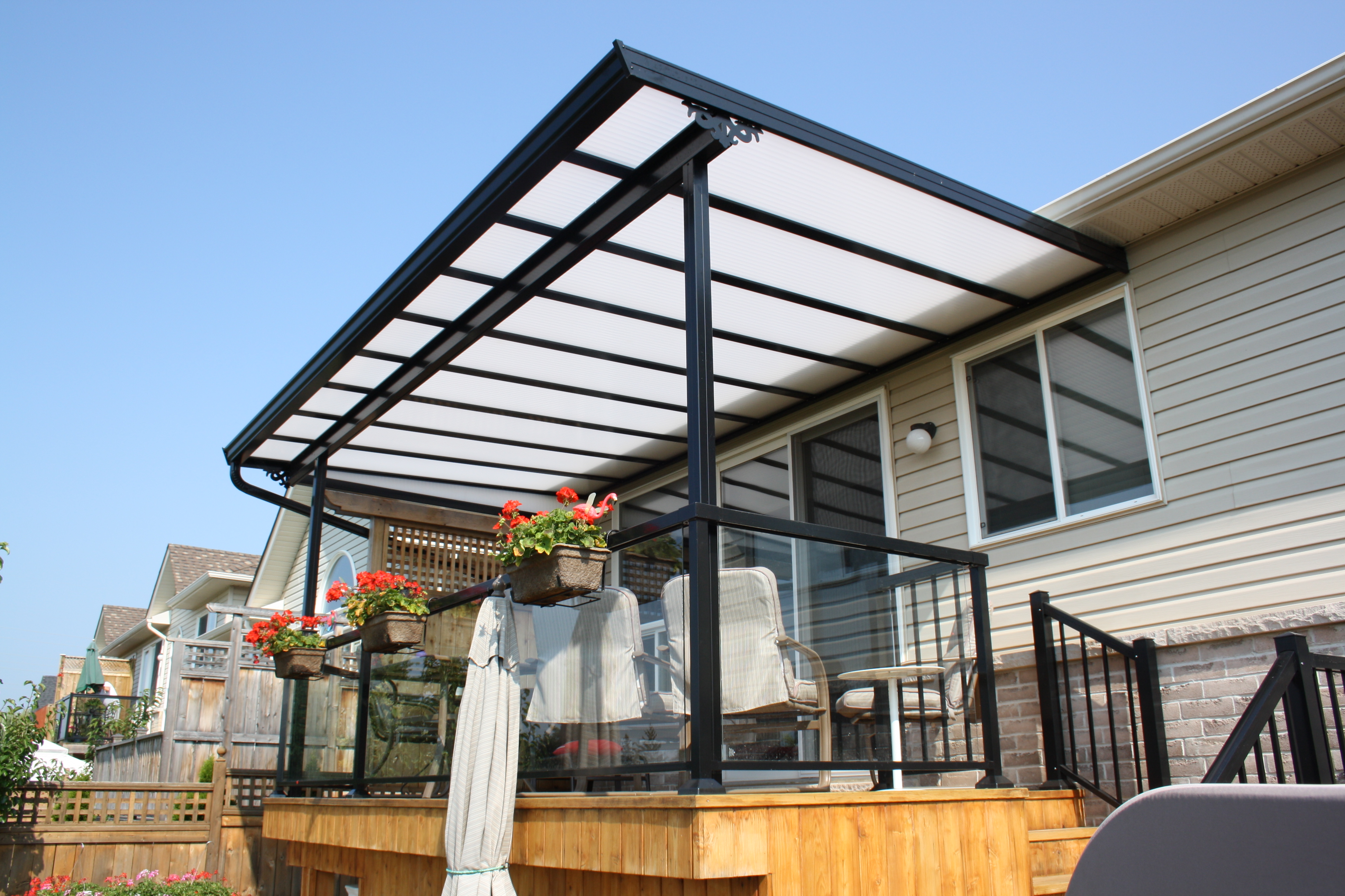 clear patio roof installed on back deck